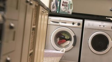 How to Remove a Panel From a Whirlpool Ultimate Care II Washer Machine